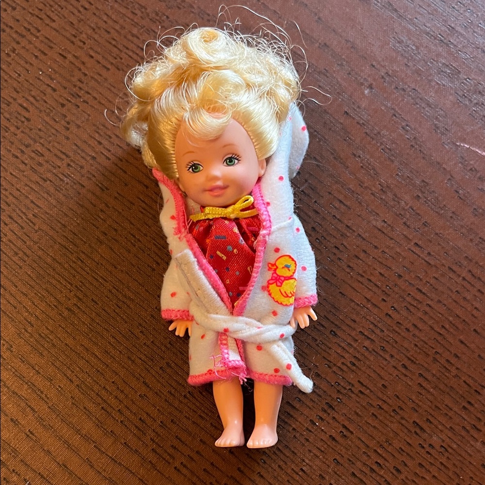 Vintage Barbie Blonde Kelly toddler in White Robe with Pink Trim and Red Outfit